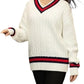 Women’s cable knitted V-neck cricket sweater in Cream color